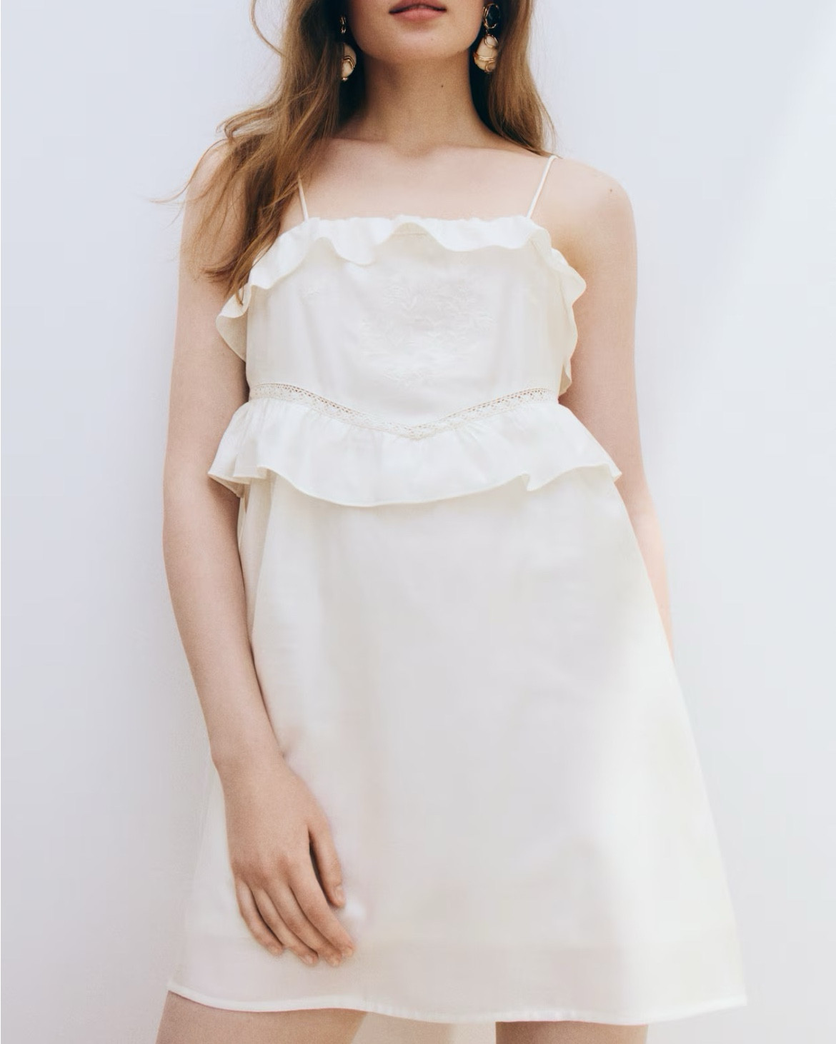 White ruffle mini dress 

#LTKSeasonal