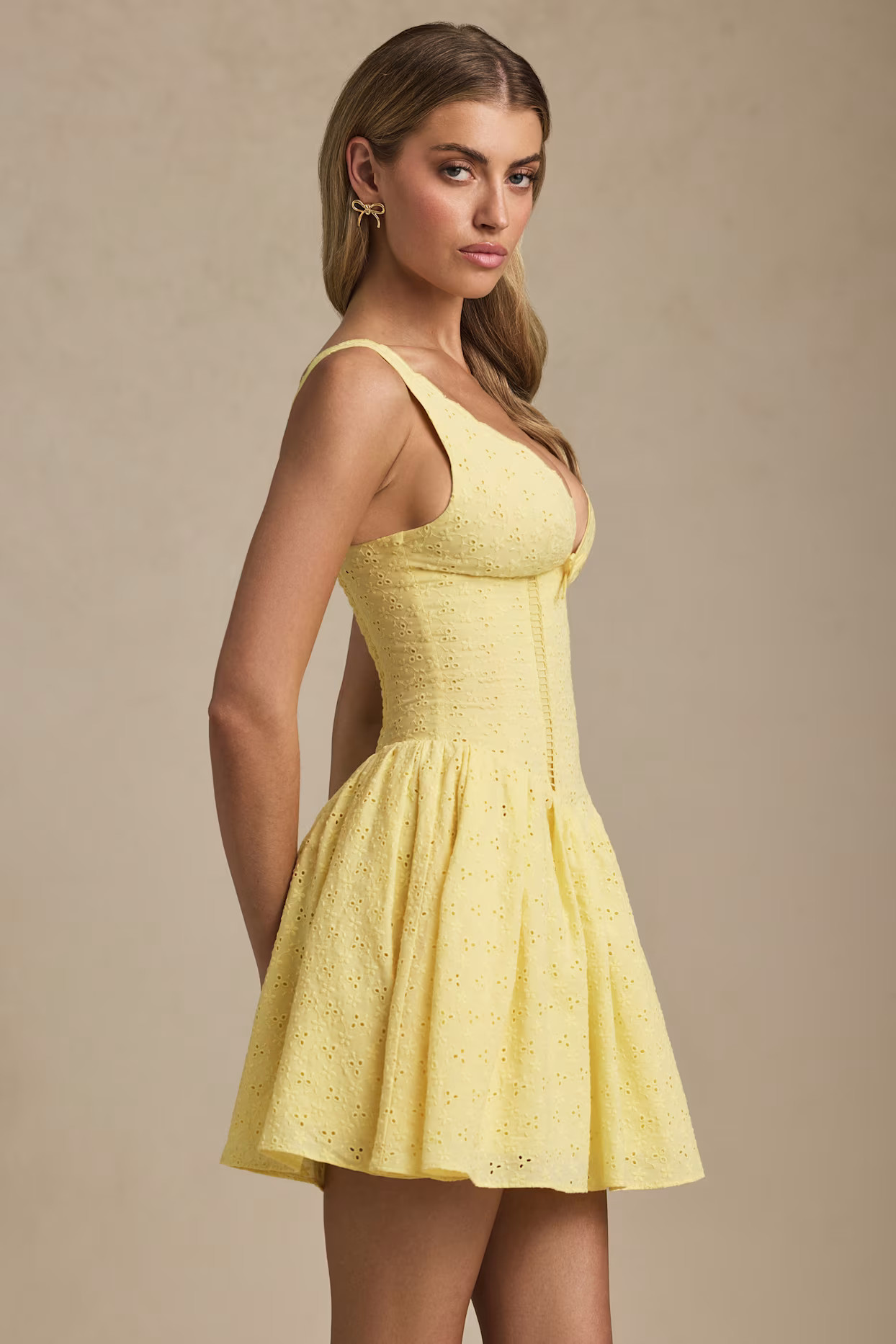 Broderie Anglaise Bow-Detail A-Line Mini Dress in Pastel Yellow | Oh Polly