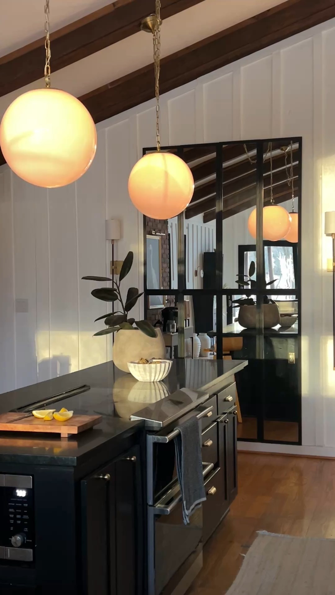 Budget-friendly kitchen decor and yummy yummy sunlight . Cabinets are Tricorn Black by Benjamin Moore and Walls are Shoji White by Sherwin Williams. #kitchen #lighting 

#LTKSaleAlert #LTKFindsUnder100 #LTKHome