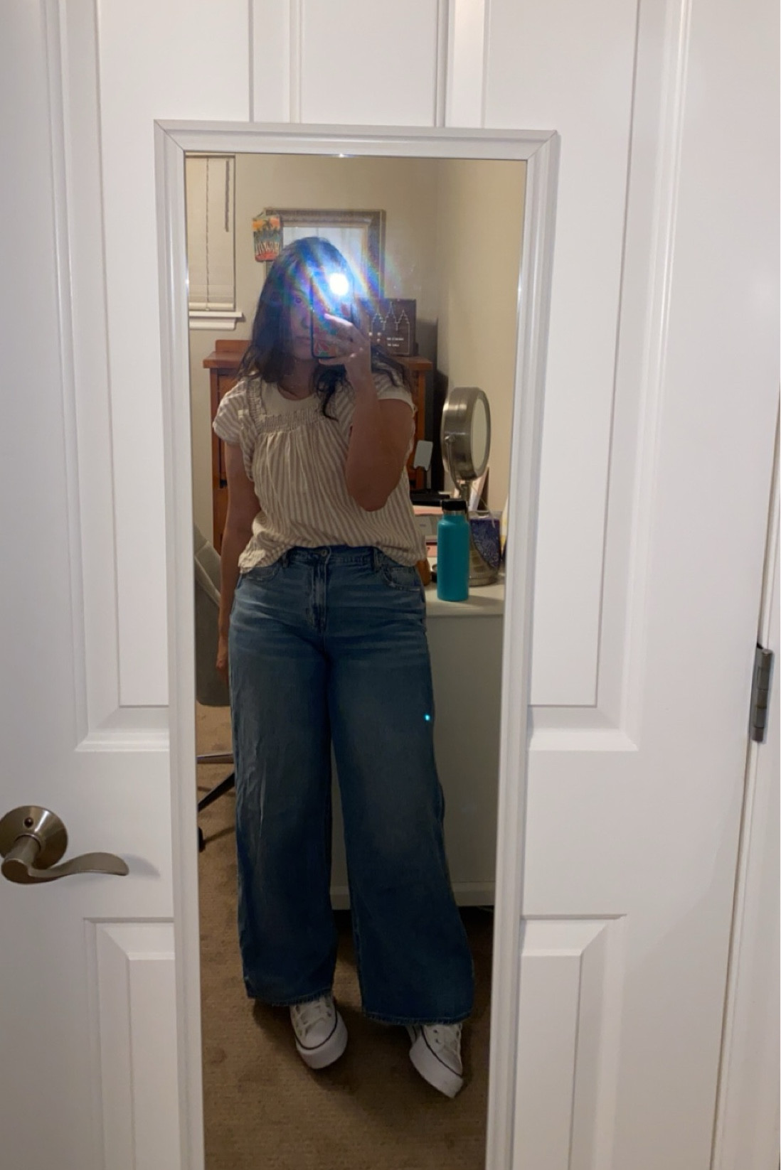 loved this outfit in the spring!!!! jeans and converse have exact links :) the stripped shirt is an old shirt from target but i linked a similar one 🫶🏼 i also layered a baby tee underneath it from brandy and linked a similar one! 

#LTKSpringSale #LTKstyletip 

#LTKU