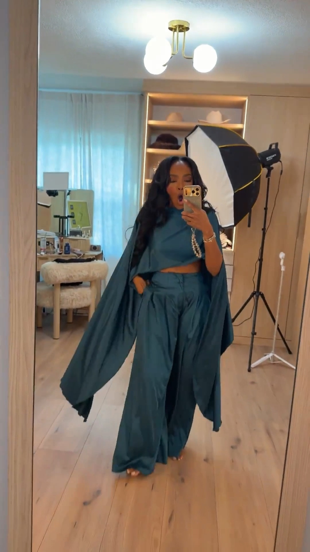 Bold, sleek, and made to turn heads — this @AKIRA satin set brings effortless drama with its draped cape detail and fluid wide-leg pants. The rich teal tone adds that luxe finish perfect for standing out.

Perfect for holiday parties, winter events, and elevated nights out.

📏 Sizing: Set — Small  
Height — 5’4” | 138 lbs | Bust — 34D | Waist — 27" | Hips — 40"

Tap to get details instantly.

akira satin set outfit, teal matching set look, holiday party outfit ideas, elevated winter fashion

Follow me on Instagram and YouTube @kirasfashionfinds

