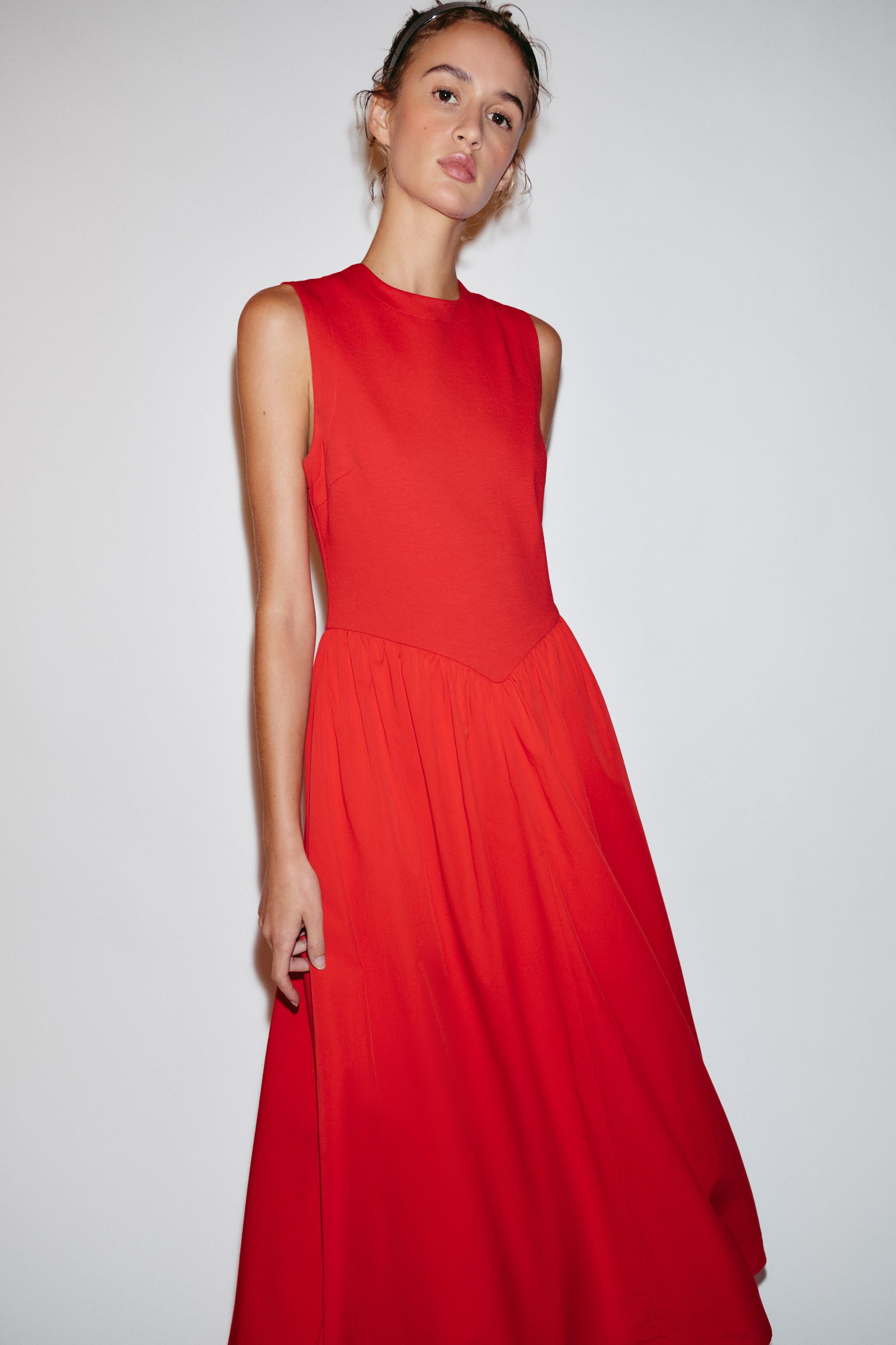Model height: 173 cmRound neck dress with sleeveless design. Featuring side in-seam pockets, a co... | Zara UK