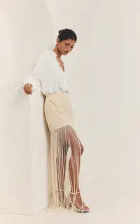 Cream Textured Fringe Tassel Hem Mini Skirt | PrettyLittleThing USA | PrettyLittleThing US