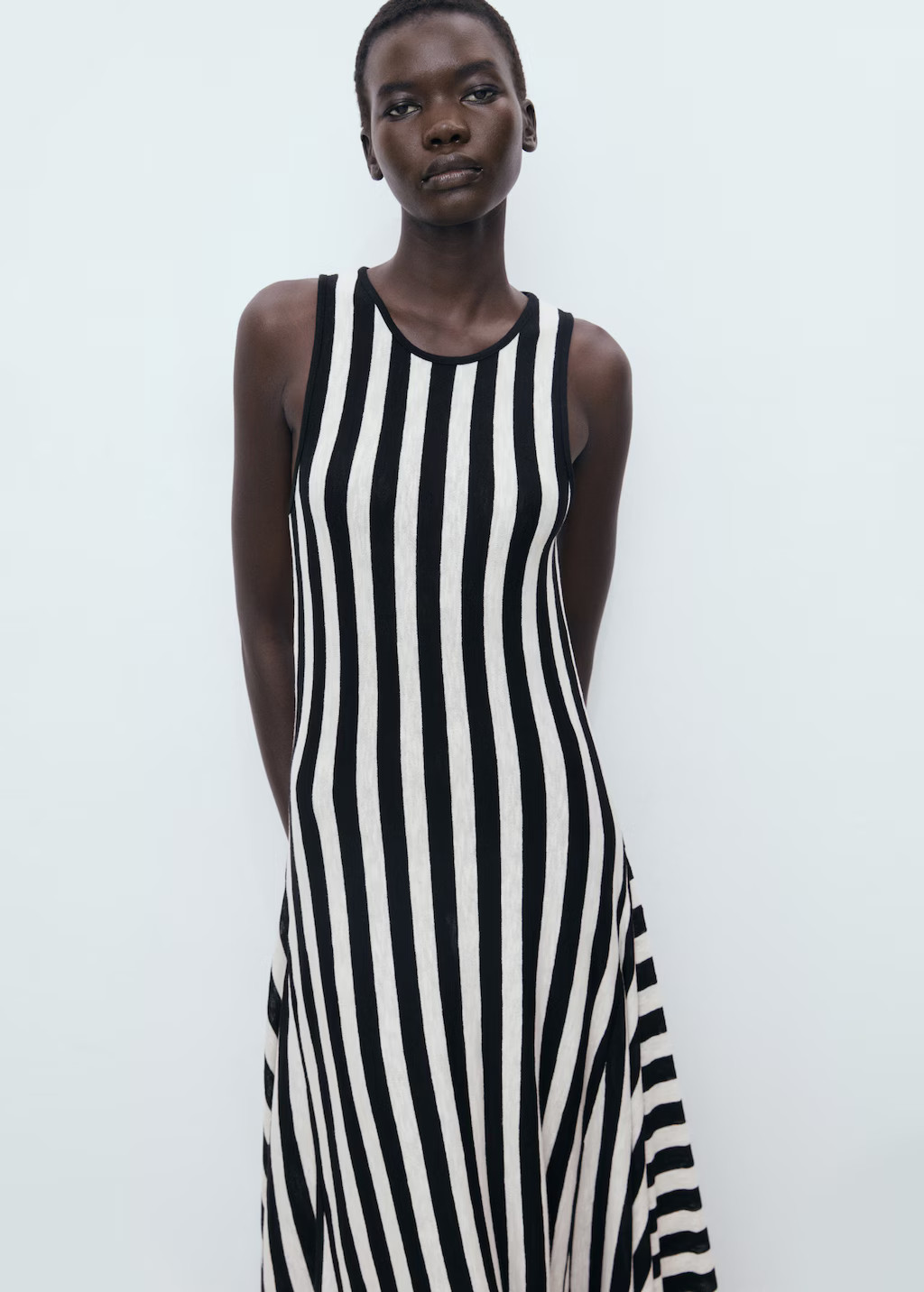 Asymmetrical low-knit dress | Mango (US/MX/AU)