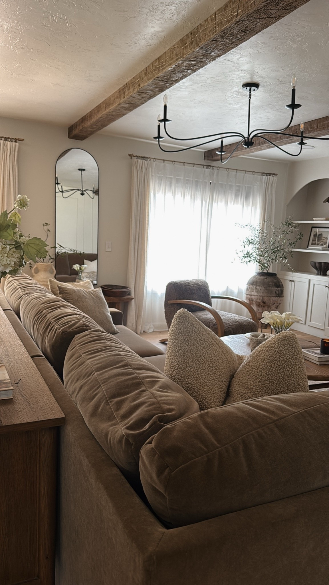 Neutral and so cozy living room vibes. This sectional is very comfortable and holds its shape. No fluffing cushions! Fabric is great for kids and pets. I also recommend all of these Amazon florals I’m linking and they are affordable!

#LTKHome #LTKSeasonal
