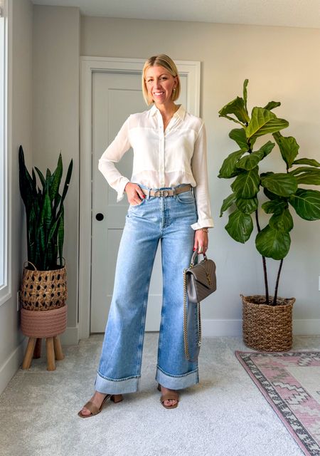 How to wear cuffed wide leg jeans over 40- pair them with a tailored silk blouse, belt, block heels for an elegant + modern lookk

I am wearing my true ass size 27 in these jeans . 

Use my code: SARAHKELLYXSPANX for 10% off my washable silk blouse

Use code: SARAHKELLYSTYLE20 for 20% off my block heeled leather sandals 

#LTKstyletip #LTKover40 #LTKSeasonal