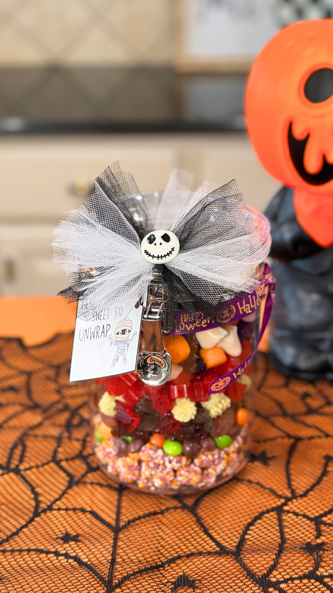 🎃 DIY Halloween Candy Jar Gift Idea 🎃
The easiest teacher gift, neighbor treat, or Halloween party favor! Fill a clear jar with Halloween candy, add ribbon + a bow, and finish with a cute printable tag. ✨ A budget-friendly Halloween gift that looks store-bought but takes just minutes to make! #HalloweenGiftIdeas #CandyJarDIY #TeacherGiftIdeas #NeighborGiftIdeas #HalloweenPartyFavors #DIYGifts #halloween #halloweengift #candy 

#LTKParties #LTKOver40 #LTKSeasonal