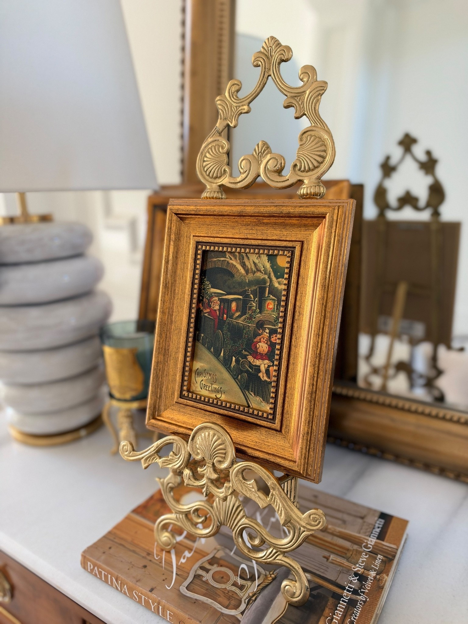 ✨ A little vintage Christmas magic ✨

I love how one beautiful vintage piece can instantly make a space feel collected, cozy, and full of character. This antique-inspired frame + ornate gold stand is giving classic Christmas with a collected-over-time feel. 🎄🤎

Perfect for a mantel, entryway, bookshelf, or holiday vignette!

🛍️ Shop this look through my LTK!

Follow along for more home décor, vintage finds & everyday favorites:
@‌miriamobrien on Instagram + TikTok

#LTKHome #LTKHomeDecor #VintageDecor #ChristmasDecor #HolidayDecor #VintageChristmas #TraditionalHome #HomeDecor #CollectedHome #AntiqueStyle #ChristmasHome #CozyHome #DecorInspiration #HomeStyling #VintageHome #GoldDecor #HolidayHome #LTKFinds