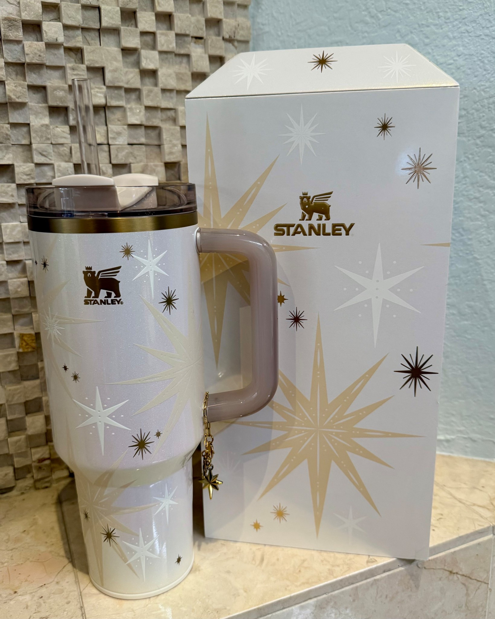😍 Oh my goodness! The new @Stanley1913 Luxe Starlight Shimmer Quencher is GORGEOUS! (#Stanley1913Partner). The packaging is top notch and I love the gold detailing and charm it comes with! It’s limited and expected to sell out quickly!  

#LTKCyberWeek #LTKGiftGuide #LTKFindsUnder100
