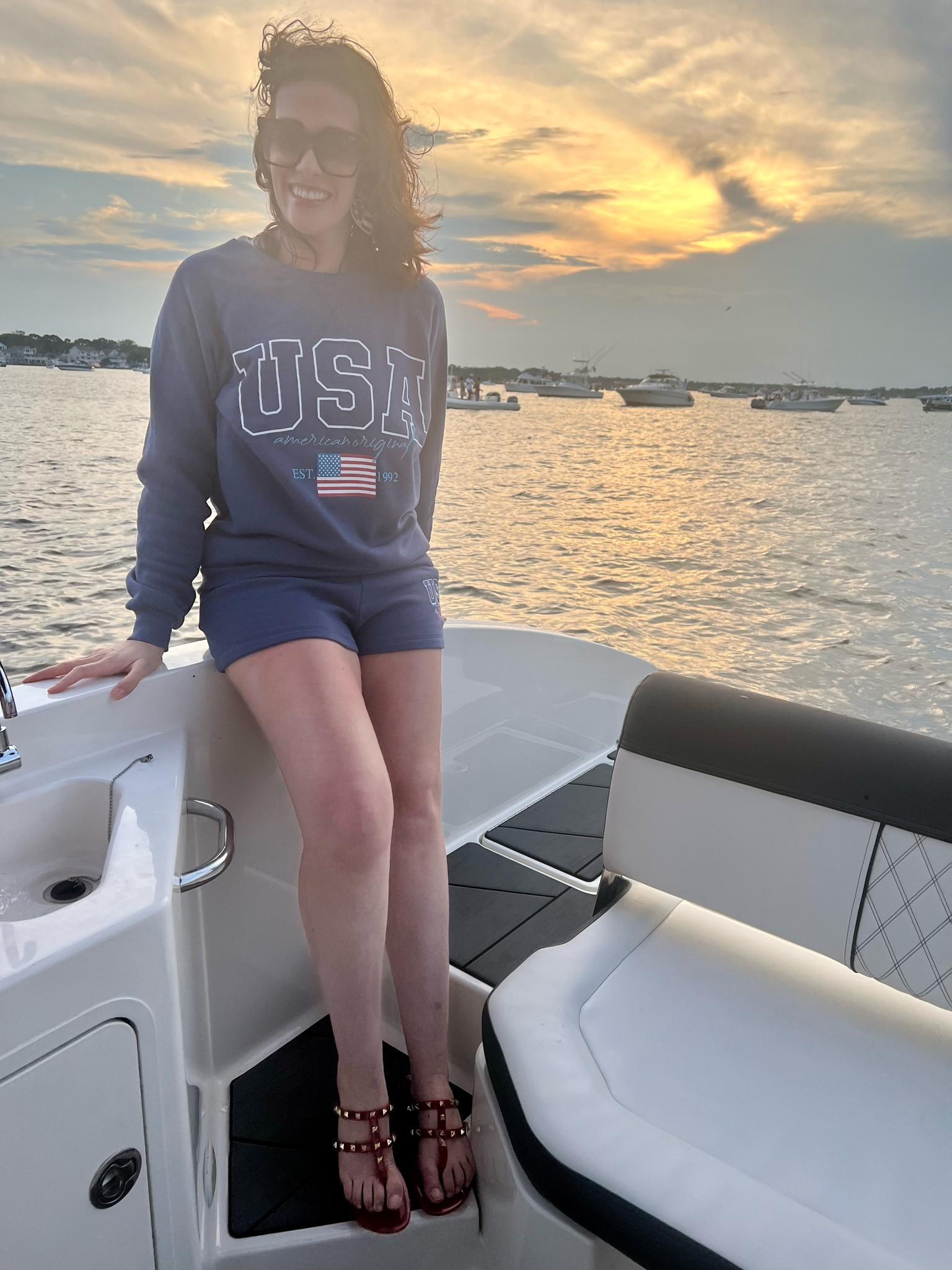 4th of July Outfit - USA Navy blue crewneck sweatshirt (size small). USA navy blue shorts (size small). Red studded sandals (size 8.5). #4thofjulyoutfit #fourthofjulyoutfit #fourthofjuly #sweatshirt #crewneck #shorts #blueshorts #sandals #redsandals #studdedsandals #summeroutfit #casualoutfit Summer Outfit Sandals 

#LTKSeasonal #LTKFindsUnder100 #LTKStyleTip
