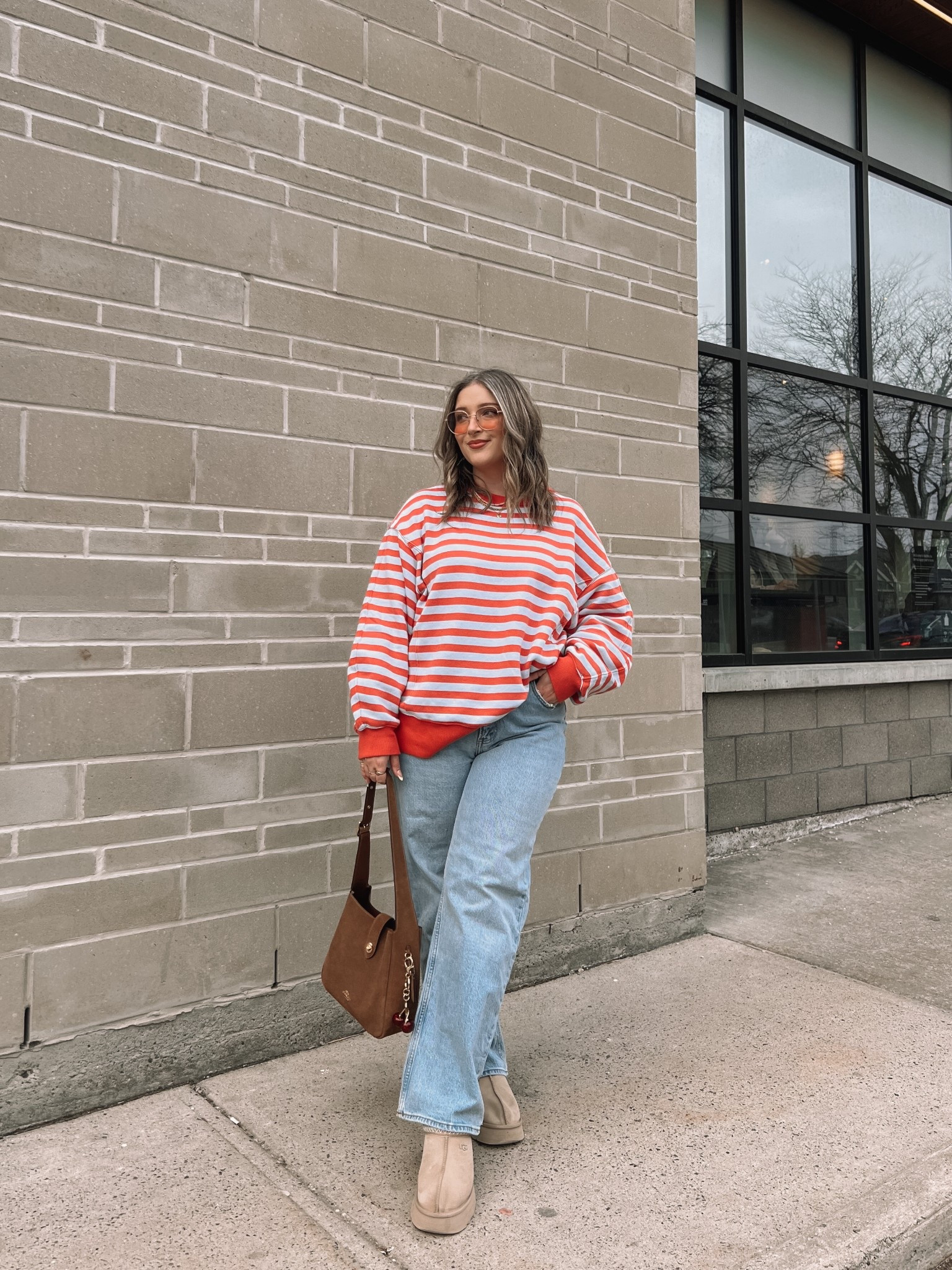 Simple & fun spring outfit! Striped sweatshirt is so cozy and I love the peach & baby blue color combo! Runs big, sized down to M. Wearing my usual 32 in the jeans. I’m a 9.5-10 shoe and wear a 10 in the Ugg tazz platforms


#LTKsale #LTKmidsize #LTKstyletip