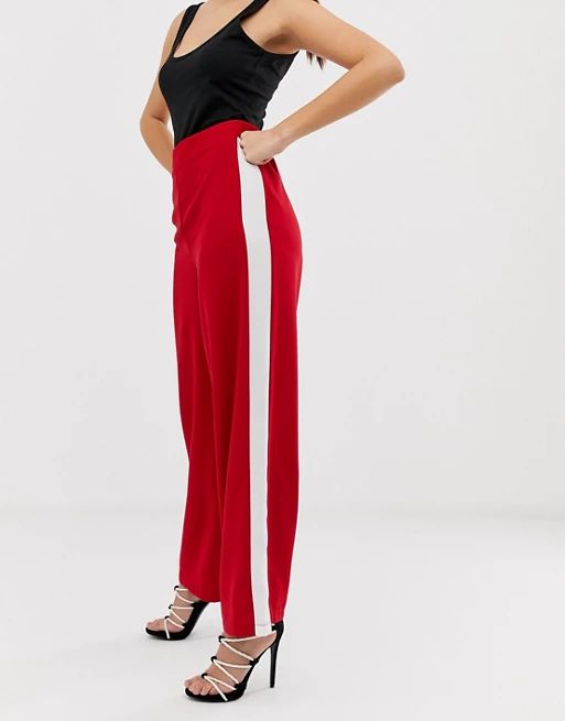 ASOS DESIGN wide leg track pants in red with contrast side stripe | ASOS US