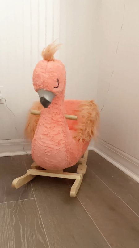 Flamingo rocker!! This is such a cute addition to a baby girl nursery. So girly and fun. My daughter is 4 months and has already used it and loves it!! Nursery, girls nursery, flamingo theme, baby toys 

#LTKbaby #LTKfamily #LTKkids