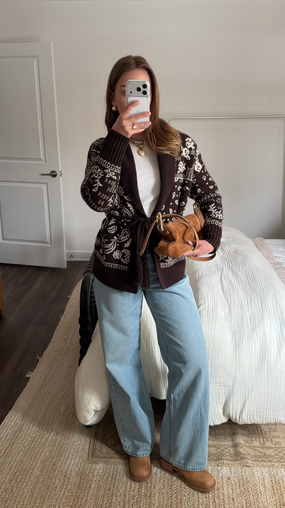 2/25/26 Outfit of the day 🤍

Wearing my favorite Abercrombie low-rise loose jeans (truly one of my most-worn pairs), styled with an Abercrombie cardigan layered over a simple white long sleeve. Finished the look with my Steve Madden boots and my suede J.Crew bag. Easy, everyday winter outfit that still feels put together. @jcrew  @abercrombie  @stevemadden-us 

#LTKgrwm #LTKootd