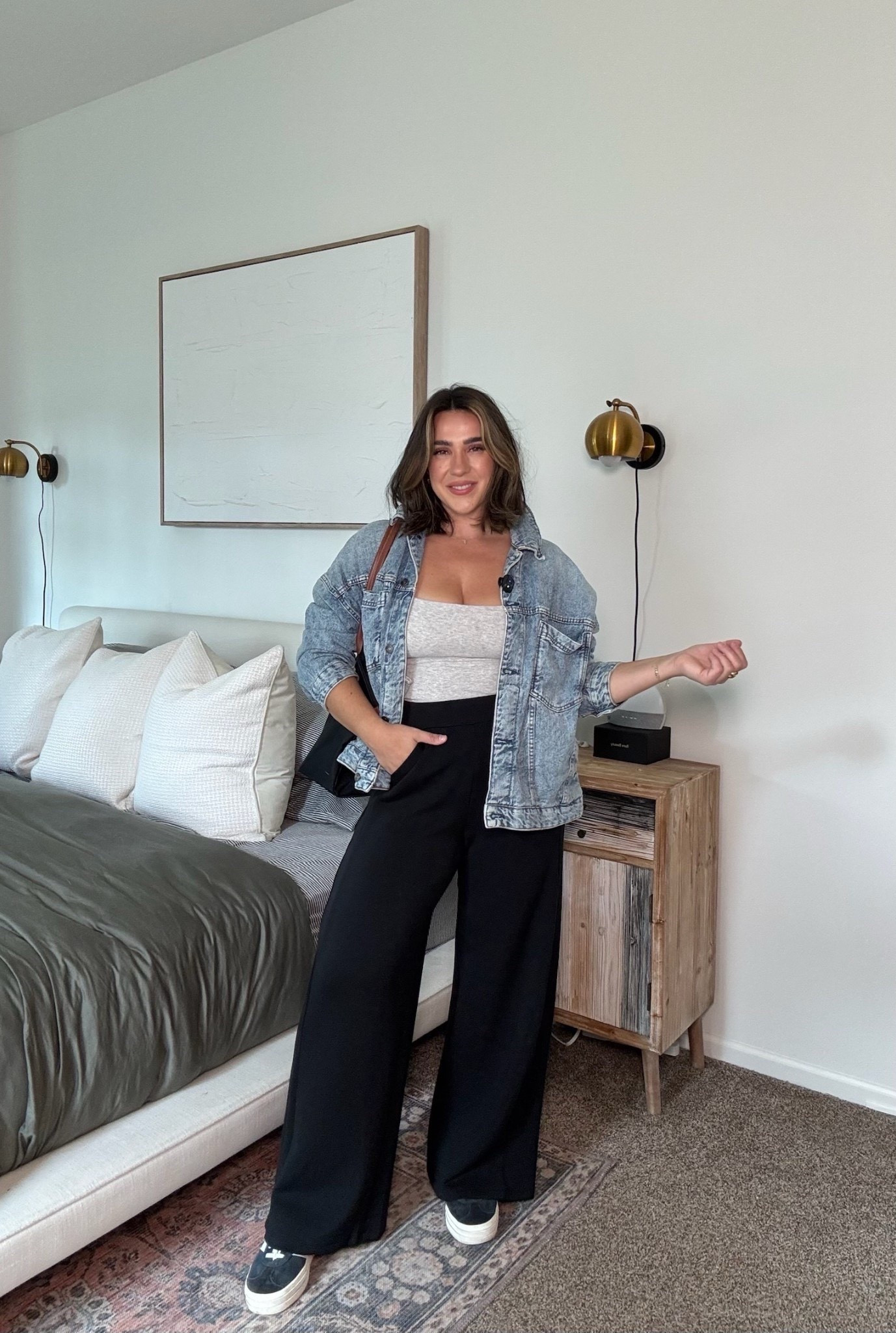 These pants have been a top seller for weeks! Elevating your everyday millennial leggings outfit. A few subtle changes and I love it so much more actually, I think because of my body shape being an inverted triangle without much hip or lower body curves the wider parts are more flattering. Plus they’re more comfy and bloat friendly. These are the coziest wide leg track pants you’ll ever own- they’re worth every penny but you can get 15% off with code ninaxspanx. I’m wearing a size L regular in the pants. The tank is a M, the jacket is a L. Shoes run .5 too big. 

Adidas, lounge airport outfit, mom outfit, school pickup, Spanx, denim, millennial, midsize, size 10 

#LTKmomlife #LTKgrwm #LTKootd