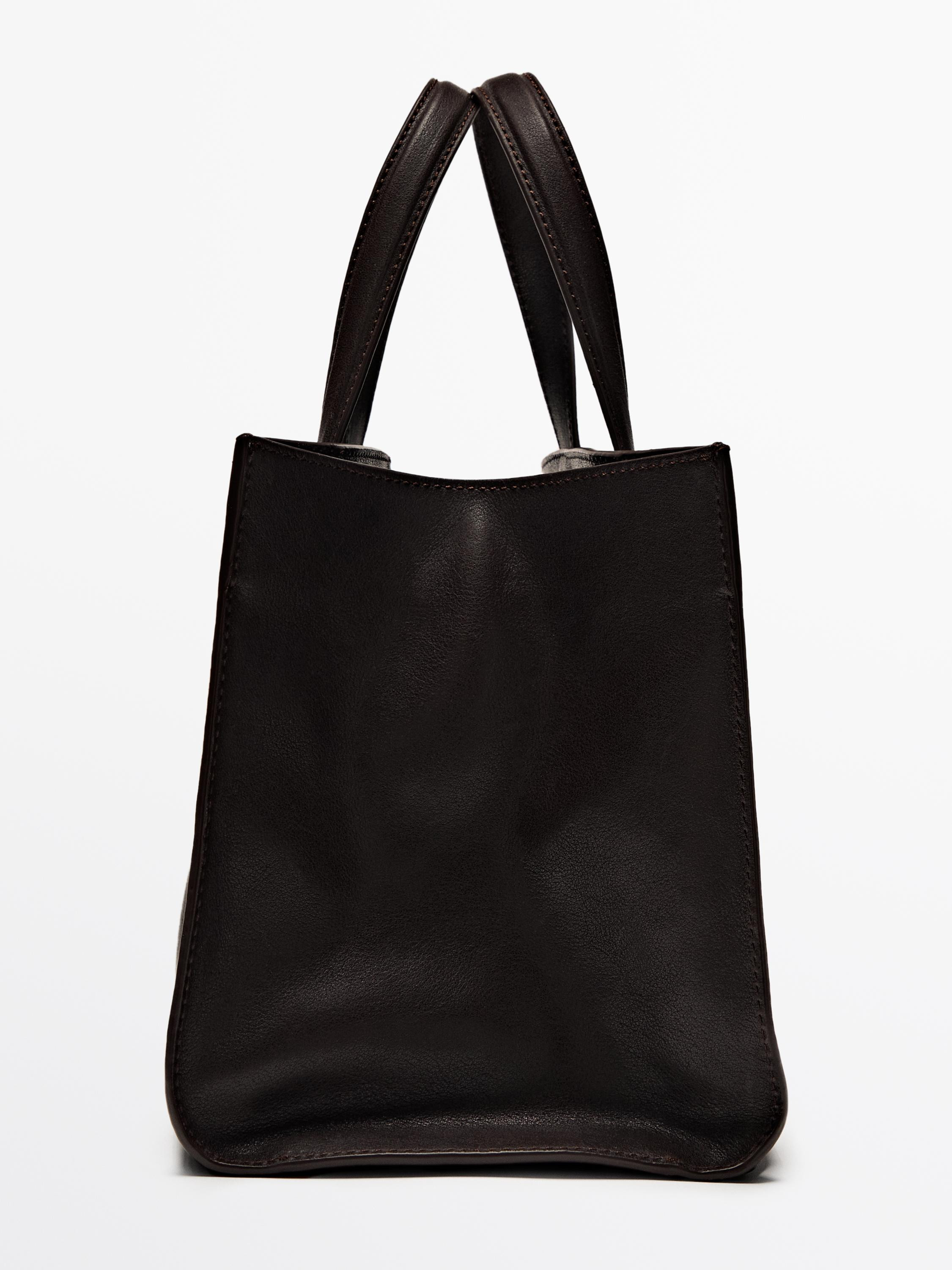 Nappa leather tote bag  $390.00 Tote bag. Main compartment. Inner buckle fastening . Two hand and... | Massimo Dutti US