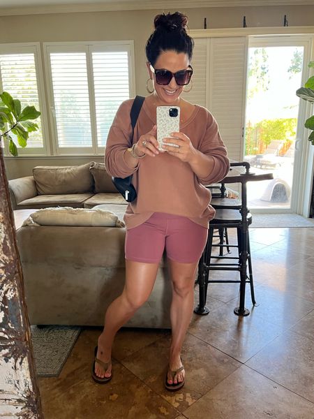 Running all the errands in my comfy bike shorts, belt bag, and summer sweatshirt, that’s on sale for $19.98z wearing a small in both. 

#LTKcurves #LTKFitness #LTKsalealert