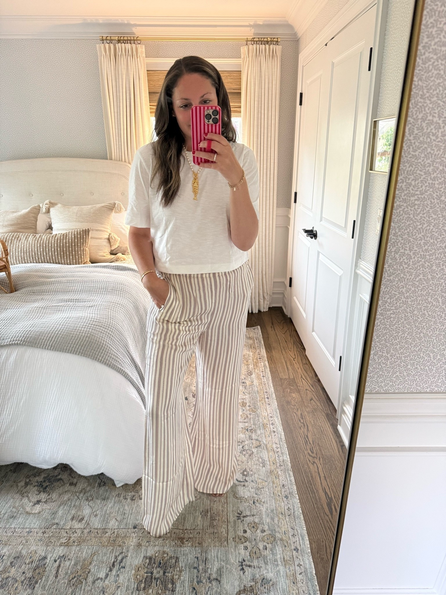 Tonight’s OOTD! Wore these silky pants to dinner and they are so good! On sale, flattering and so comfortable. Also love this summer fish necklace (on sale!!) and perfect white tee 🙌🏻

#LTKSaleAlert #LTKootd #LTKdayinmylife