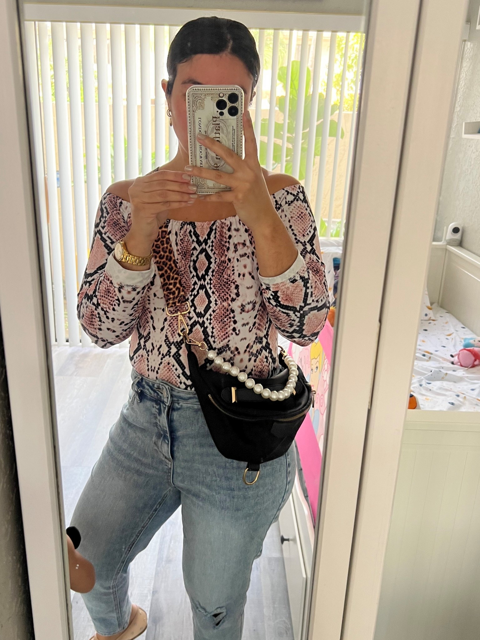 Easy chic weekend look 

fall looks // snake print // fanny pack // bag charms