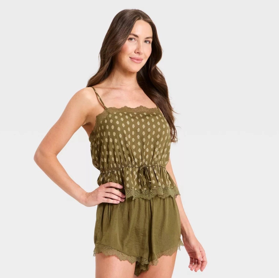 The shorts come in a set with a button up top. The cami is a separate. 