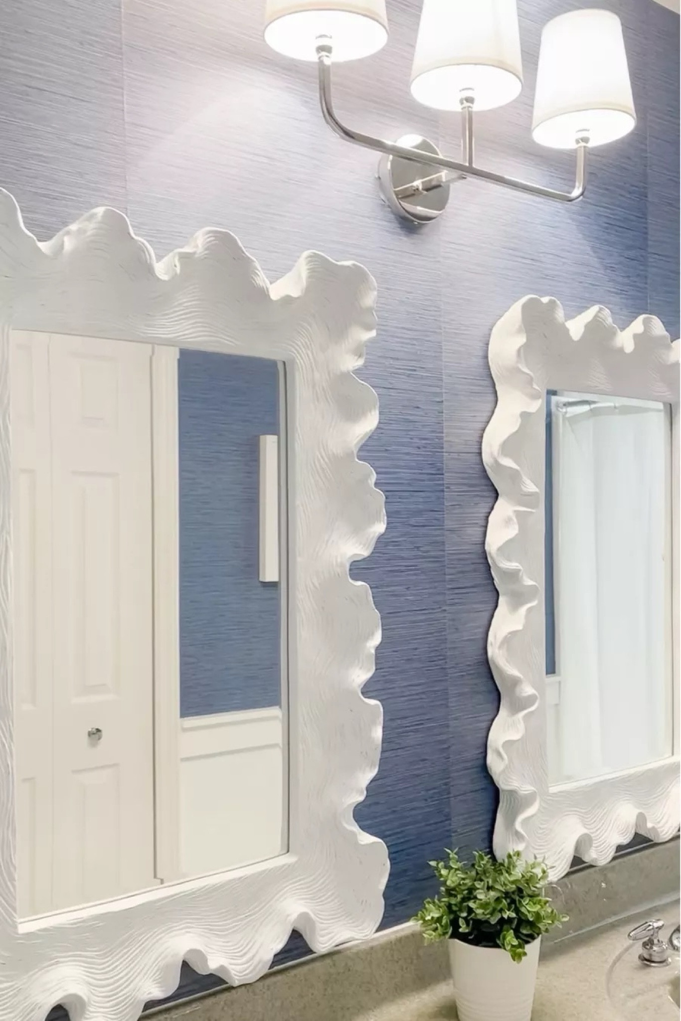 Coastal bathroom inspiration! ✨💙 Love these white scalloped coral bathroom mirrors and how they pop against the Blue wallpaper
12/4

#LTKStyleTip #LTKHome