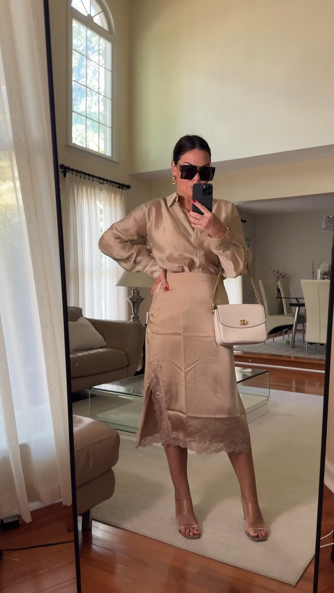 Fall chic in neutrals 🤍
Satin skirt with a lace-trim slit — pure elegance and femininity.
Paired with a matching satin blouse (almost sold out — hurry if you love it!) and styled with statement sunnies, clear heels, and a structured bag for that refined, timeless look. ✨
Effortless elegance from day to night.

#LTKStyle #FallChic #LTKOutfit

#LTKStyleTip #LTKFindsUnder50