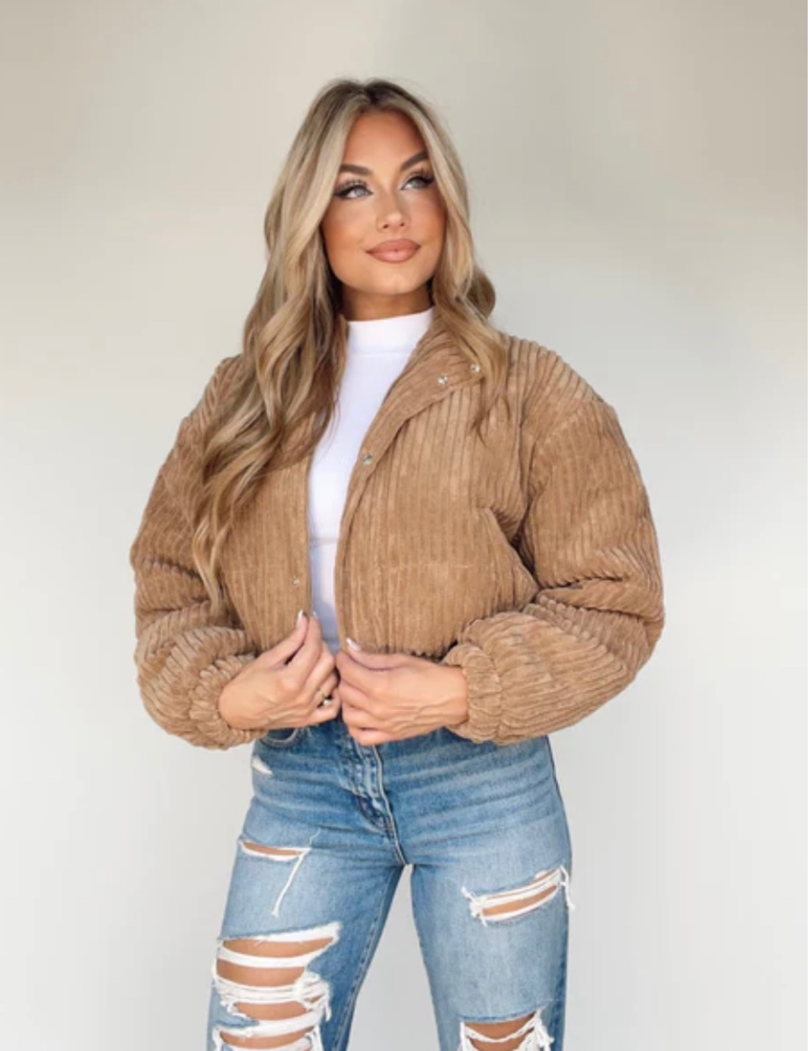 Bestseller!

This sophisticated Corduroy Puffer Jacket is your perfect autumnal companion. With its cozy corduroy construction, collared neckline, and button closures, it provides the ideal balance between warmth and style. Perfect for tackling pumpkin patches, tailgates, and other seasonal activities, it's an elevated and versatile look for any fall occasion.

#LTKstyletip #LTKSeasonal #LTKHoliday