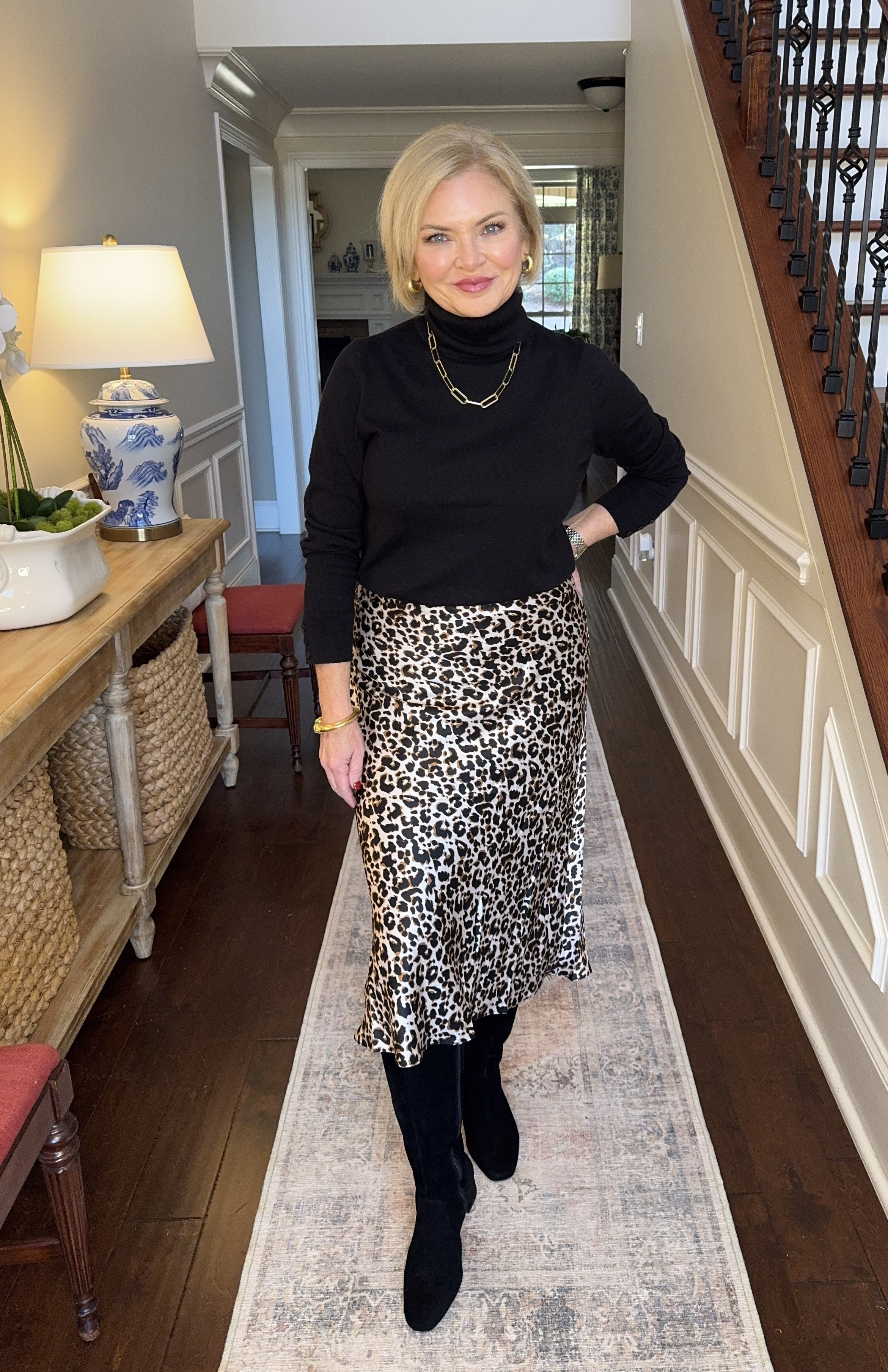A simple black turtleneck is the perfect partner for this leopard print silk skirt!  I wear a Small in this skirt and the turtleneck is Medium Petite.

leopard print
winter outfit
silk skirt
suede boots
Talbots
Quince
Petite

#stylewithserena
#fashionover50
#midlifefashion
#huntsvilleinfluencer
#alabamainfluencer
 

 #LTKSeasonal #LTKSaleAlert #LTKFindsUnder100