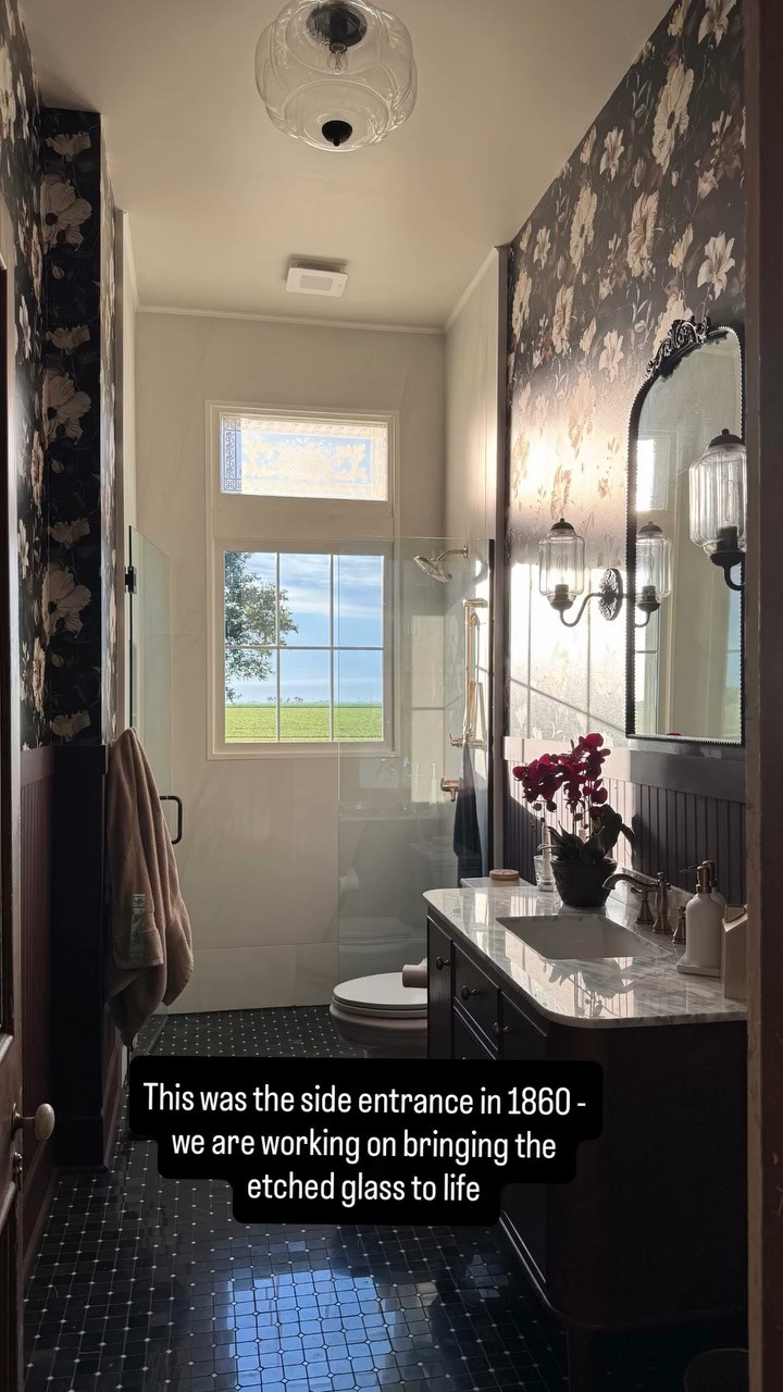 This had the screen to nothing for the last 8 months or so. It used to be a creepy window held together with a chain 😳 if you remember the 1960 murder gas station look. 

It was the side entrance to the house in 1860. Assuming when indoor plumbing came about, they made the hallway and moved the door. 

Now, the screen is down! It did offer privacy so the reeded glass firm is on the way! Stay tuned for the cleaning and paint. Until then, don’t look when we are showering! 😂
