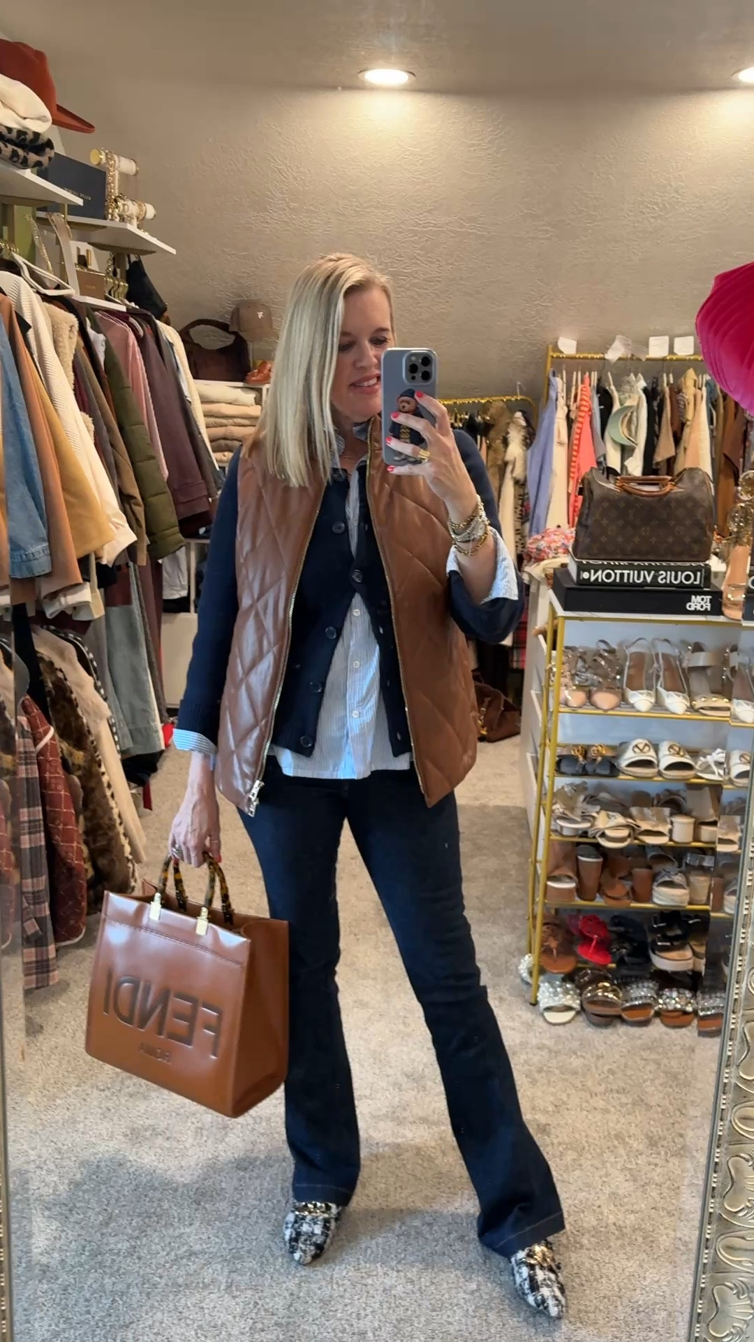 Spring outfit I spoke cooler temp

Mixing navy, light blue and cognac brown

Faux leather quilt vest Chicos (older limited similar

Fendi tote in cognac brown 
⚠️Vivrelle use code DARCY
To get your first month free
🤍Designer bag rental 

Spanx jeans tts and one of my favorite pull on tummy support jeans
⚠️Use code  Deardarcyxspanx to save 15% off order 

Blue and white stripe button up shirt. Tts 

Quince cardigan sweater with front pockets  tts
⚠️ use code 
INFG-26DARCYVANDENBERG10
To save 10% off order

Steve Madden tween mules
(Old) linked similar tts


#LTKootd #LTKSaleAlert #LTKWorkwear