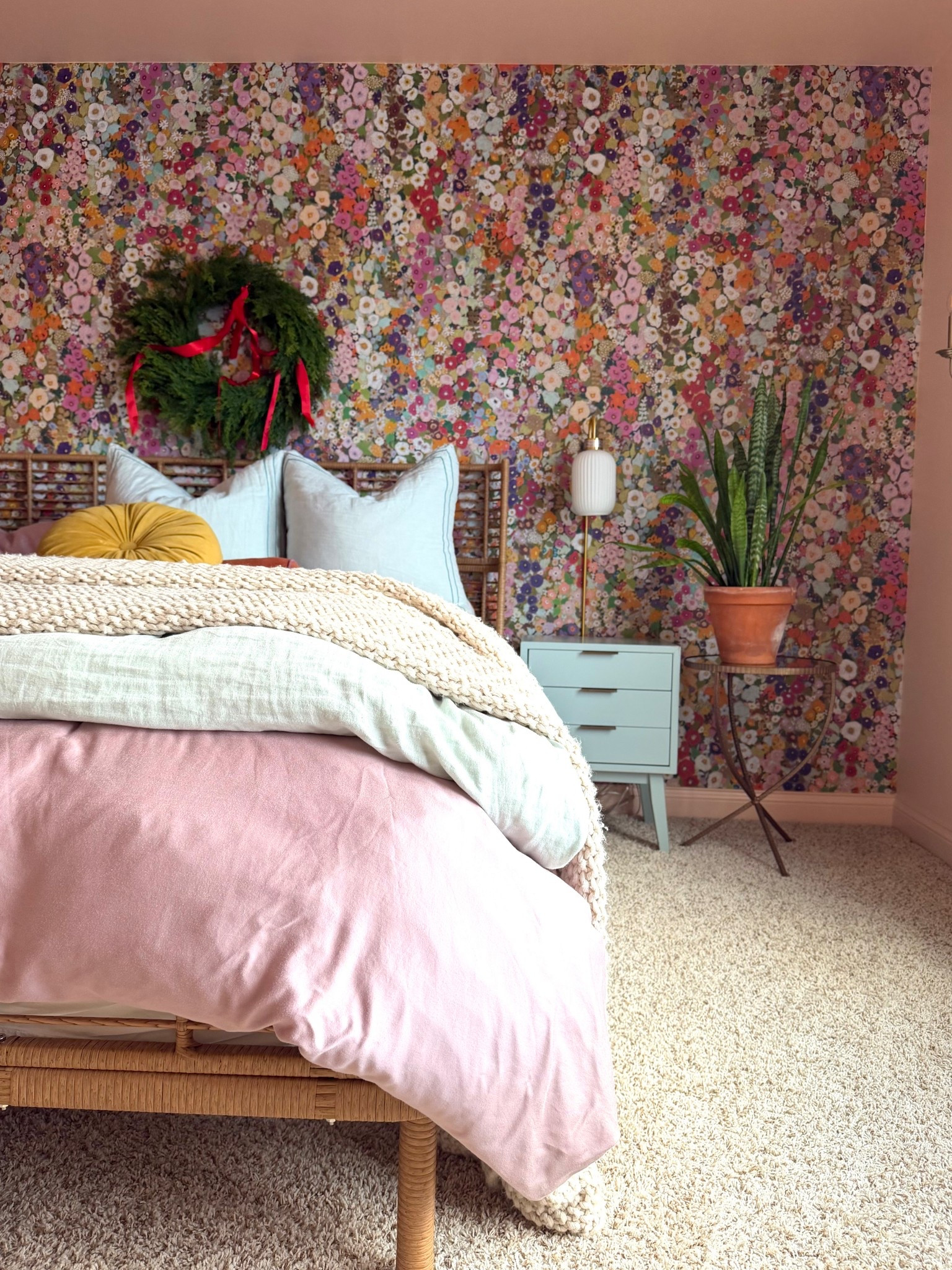 Walking into this guest room feels like stepping straight into a storybook — the kind where every wall is blooming and every corner whispers, “Stay a while, darling.”

The House of Hackney wallpaper from Anthropologie is the star of the show — unapologetically floral, wildly colorful, and exactly the kind of maximalist magic I adore. I layered in a warm little glow with a vintage-inspired sconce and piled the bed high with joyful colors, textures, and the softest cream knitted blanket for that come-take-a-nap energy.

It’s cozy, it’s colorful, and it’s exactly the kind of room I want my people to feel loved in. 💐✨

maximalist guest room, colorful guest room decor, House of Hackney wallpaper, Anthropologie wallpaper, floral wallpaper room, layered bedding, cozy guest room ideas, maximalist home design, colorful home style, eclectic guest room inspiration 

 #LTKHoliday #LTKSeasonal #LTKHome