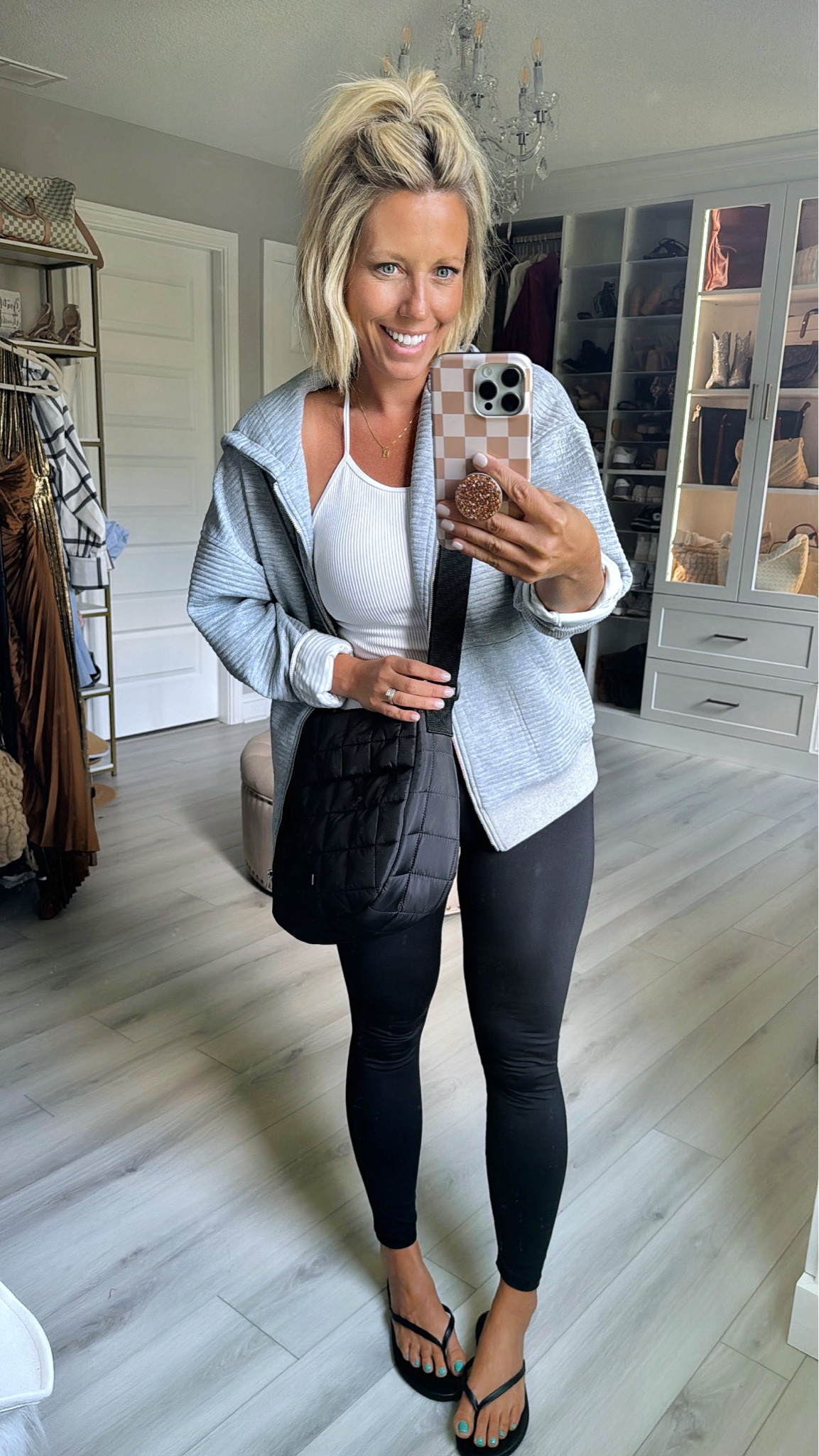 Comfy OOTD!!! Most days this is as fancy as I get!!!! This tank is one of my all time @amazon finds! It has a built in bra that is actually supportive and comfy!!!!
⬇️⬇️⬇️ 
Hoodie sized up to medium
Tank TTS small
Leggings sized down to XS for more of a compressive fit
Flip flops in my true size but run a little small

#LTKMidsize #LTKFindsUnder50 #LTKStyleTip