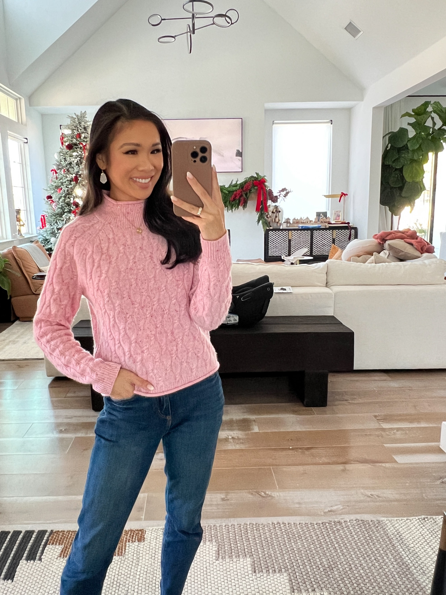 Winter outfit with pink cashmere rolled neck sweater with dark wash jeans for a chic look! Wearing size XS in the sweater and it fits TTS! On sale for 20% off and jeans are on sale for 25% off plus an additional 15% off with code CYBER15!

#LTKsalealert #LTKstyletip #LTKCyberWeek