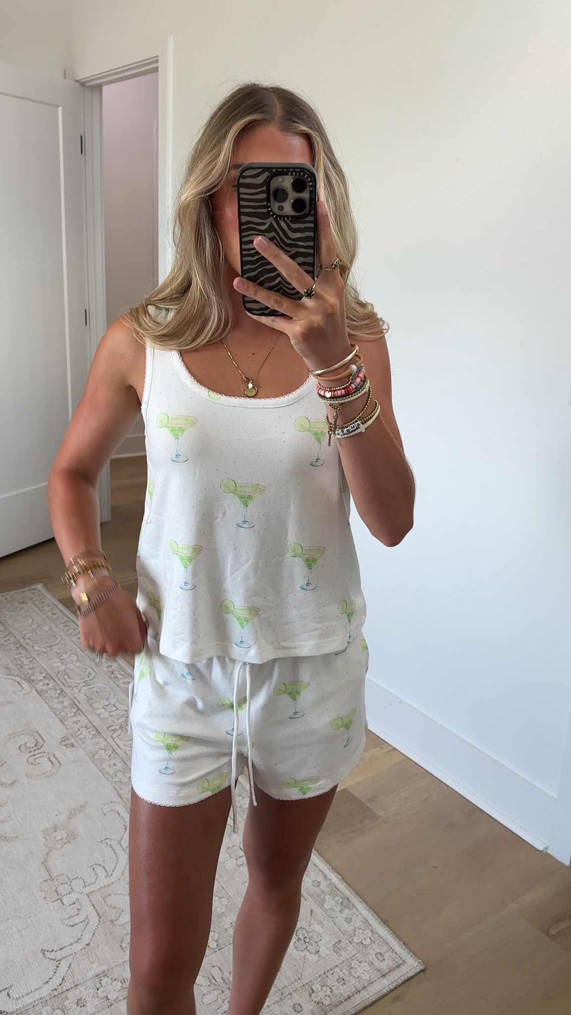 @PJ Salvage size XS Margarita print. Light, breezy, and ready for a getaway. This buttery-soft sleep tank features an ivory ground with a playful margarita print and tiny pink dots throughout. The easy fit and delicate picot trim make it perfect for vacation relaxing or channeling the vibe at home.

#LTKootd #LTKSeasonal #LTKdayinmylife