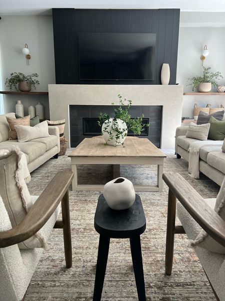 Summer views.. lighter and brighter living room with white vases. But always with pops of black to add interest. 
Modern organic home decor 

#LTKfamily #LTKFind #LTKhome