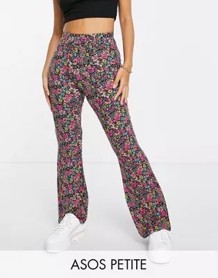 ASOS DESIGN Petite kick flare pants in dark based floral | ASOS (Global)