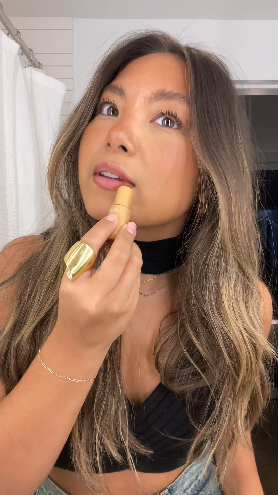 cream bronzer in dune as a liner (stays on so well!) and fenty lip oil in cherry for an oily glossy layer xx 