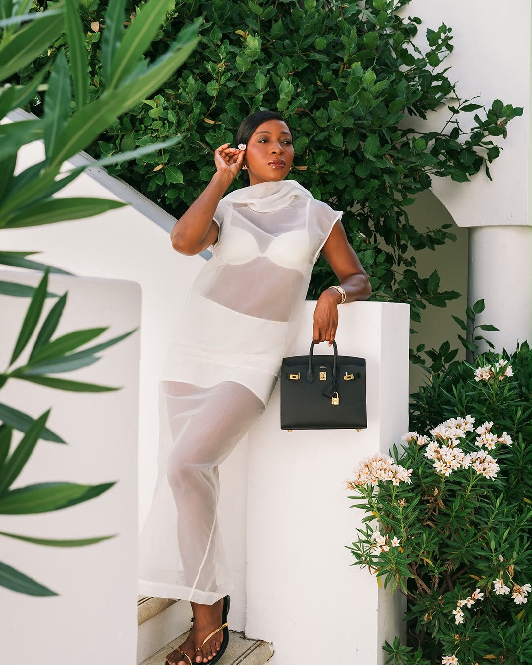 Sheer Contrast

A soft white sheer silhouette styled with a structured black bag and subtle gold accents. The contrast between airy transparency and sharp accessories gives the look a clean, modern elegance.

#LTKstyletip #LTKsummer #LTKFashionMonth