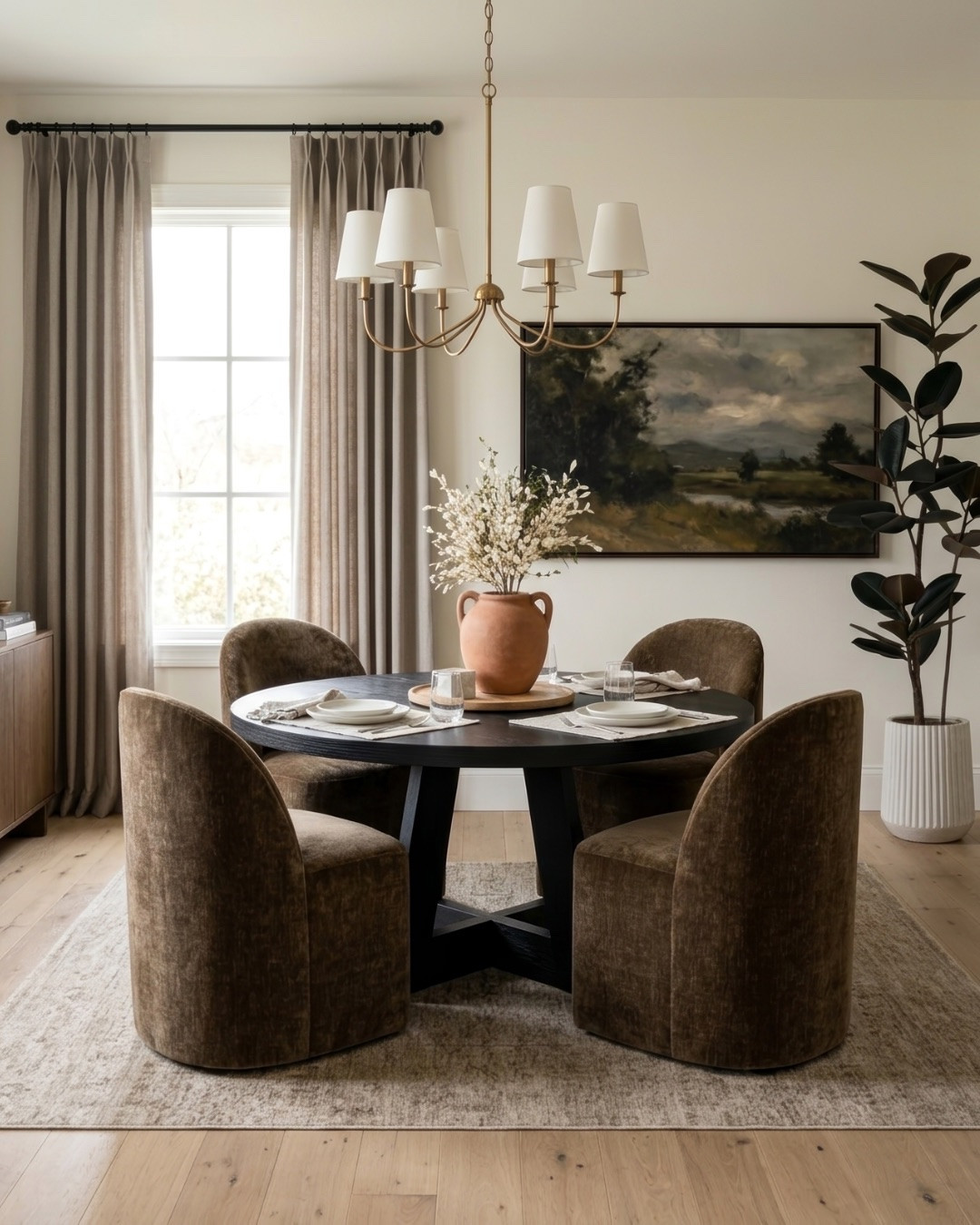Bold Round Black Table Dining Room Design

I designed this dining room around the round black table and deep brown dining chairs. It ended up having such a cozy, moody look. The wall art pulls from all the colors through the room. I love how it came together!

*Note: This is a digital mockup of my room design mood board.

#diningroom #diningroomdesign #diningroominspo #moodboard #homedecor

#LTKHome