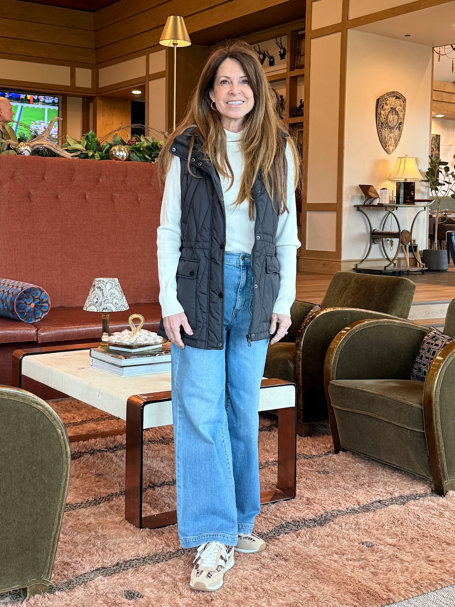 Brunch outfit. Cozy look for cool winter days. Wide leg cropped jeans that are longer on my petite height with a ribbed turtleneck sweater, leopard sneakers and a black vest with removable hood. 

#LTKPetite #LTKFindsUnder50 #LTKOver40