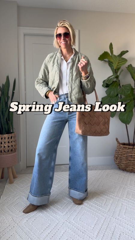 Wide leg jeans spring outfit idea🌷 a crisp white, button-down short adds a polished touch to these casual, relaxed jeans, add a quilted bomber jacket for texture and interest. Finish the look with woven ballet flats, and a leather tote.

I’m wearing my true size small in the oversized, button-down shirt, size 27 in the jeans, size medium in the jacket 

#LTKVideo #LTKover40 #LTKstyletip