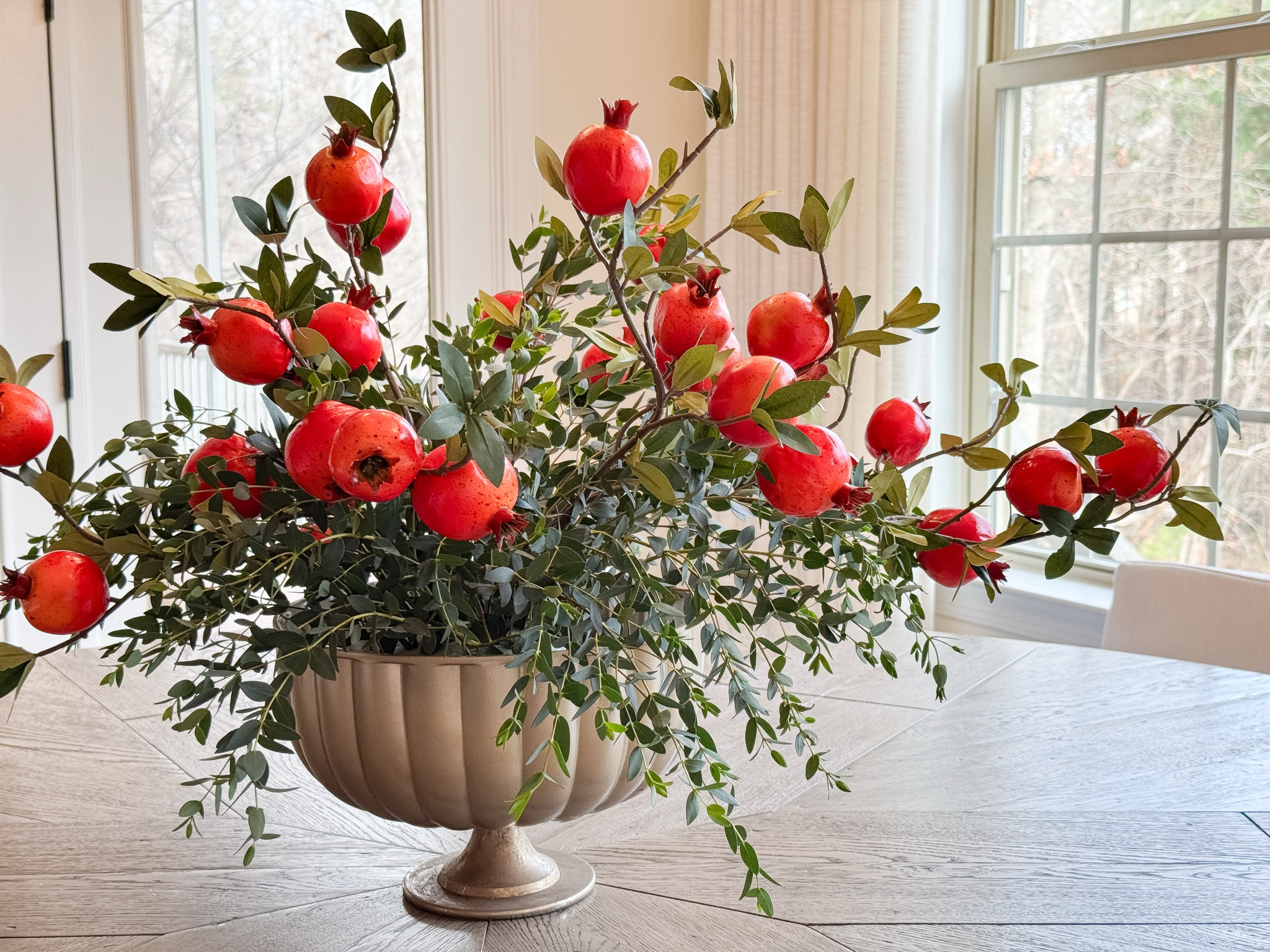 Seasonal Christmas table centerpiece pomegranate 

#LTKHoliday #LTKHome #LTKSeasonal