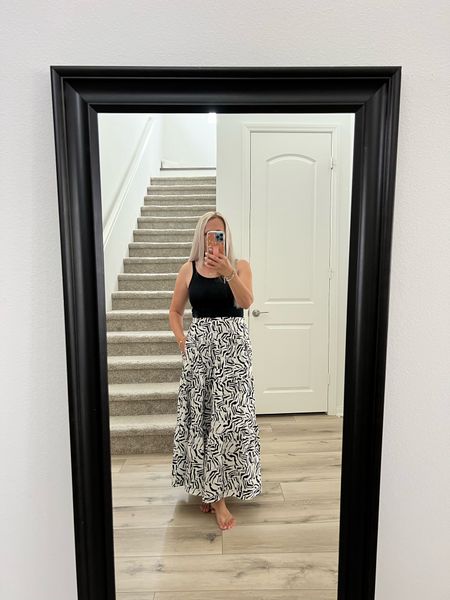 Loving this new taffeta maxi skirt! It’s so comfortable and flattering and it has pockets! I paired it with a jean jacket for church but would also be perfect for a summer bbq or vacation! It also comes with a matching cropped top top! 

#LTKFindsUnder50 #LTKStyleTip #LTKSeasonal