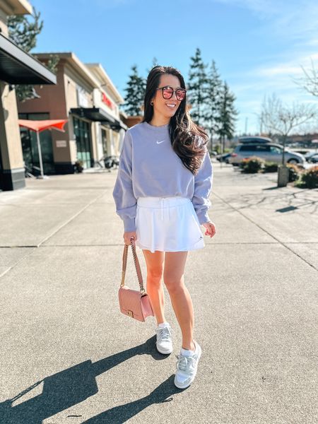 Nike sweatshirt
Tennis skirt
Skort
Nike dunk
Casual spring outfit
Athleisure 


#LTKover40 #LTKfindsunder100 #LTKActive