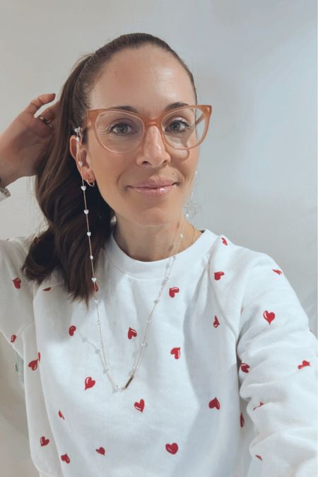 Valentines ready in my sweater heart hoop earrings and heart grandma chain for my glasses! All linked to shop & check out my Valentines collection to shop many other Valentines ideas I’m loving - more in stories of more items I just bought and am loving for the holiday 💌 💘 

#LTKSeasonal #LTKfindsunder50 #LTKGiftGuide