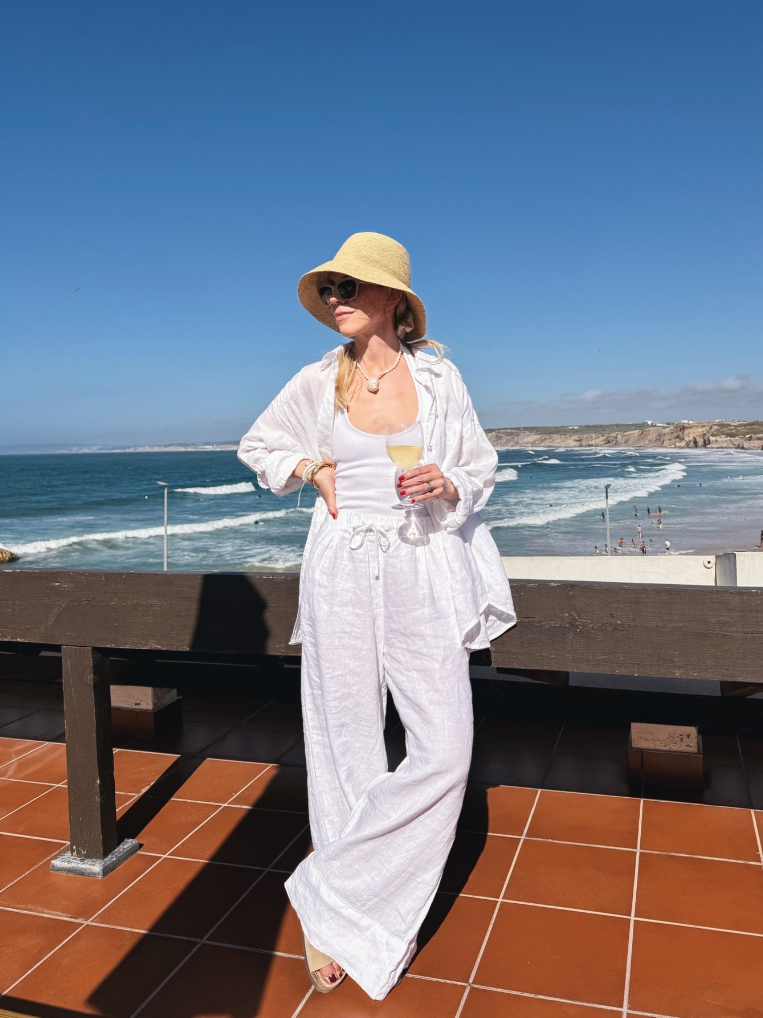 Beach vacation look, Euro summer, all white linen outfits, wide leg @Zara linen pants, @Janessa Leone straw bucket hat, seashell necklace

#LTKTravel #LTKSeasonal #LTKSaleAlert