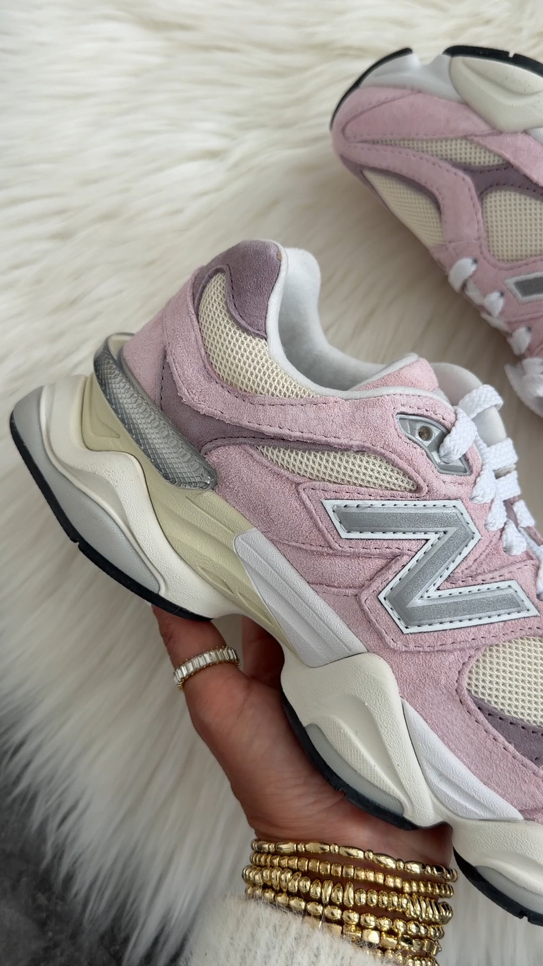 New Balance 9060 sneakers run 1/2 size big. Color: rose sugar with angora and ice wine 
