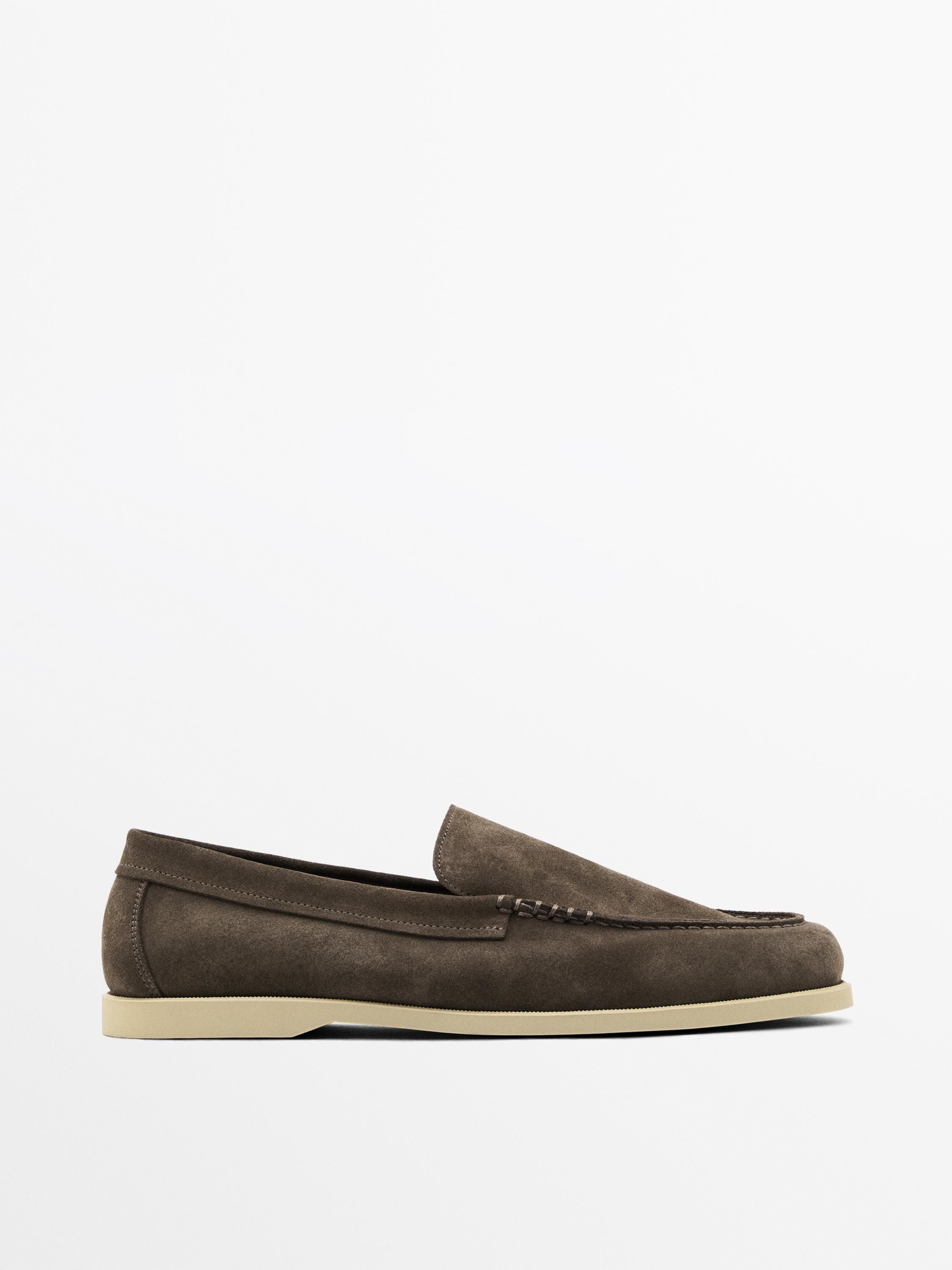 Made of cowhide leather with a suede finish. Sheepskin lining. Matching topstitching. Made in Por... | Massimo Dutti UK