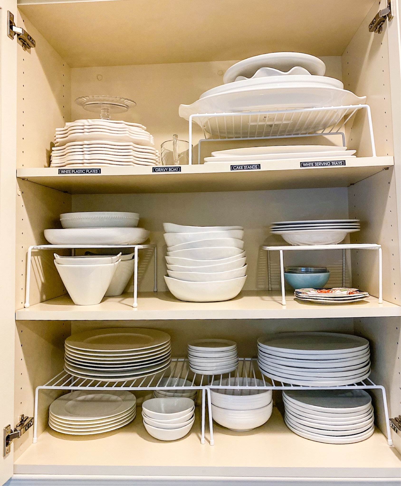 Use tiers to help utilize vertical space in cabinets