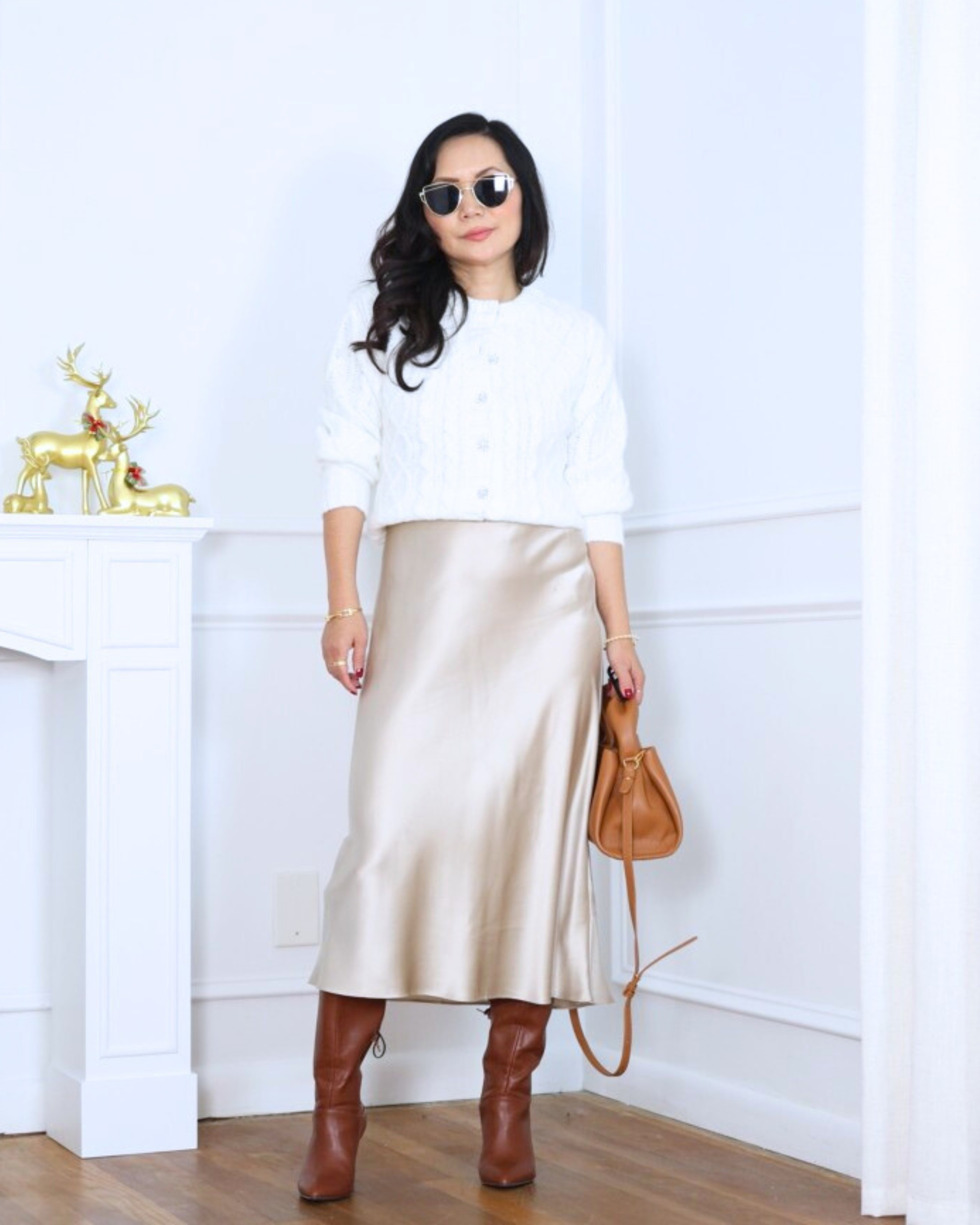 Cozy with a polished twist — this chunky knit cardigan from Walmart paired with a silk midi skirt from Quince and boots from Loft feels effortlessly chic. Perfect for dressing up soft textures while staying comfortable and put together. I’m 5’2, wearing size XS.

#LTKOver40 #LTKootd #LTKPetite